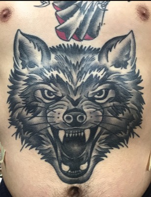 Wolf tattoo on the stomach 
