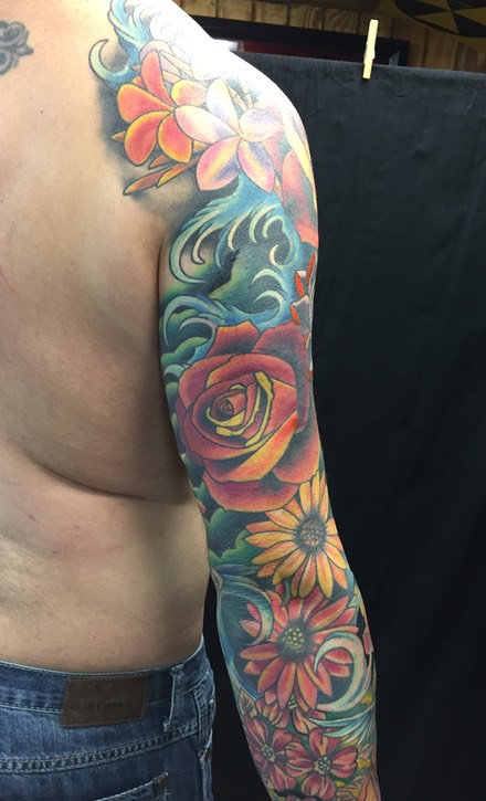  Tattooed sleeve of flowers 