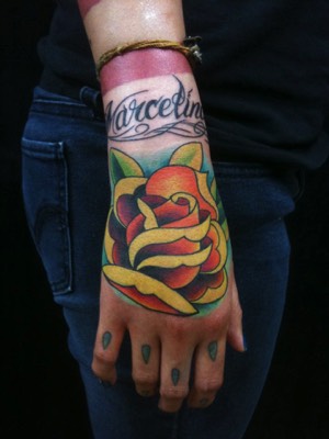  Hand rose tattoo by Brandon Notch 