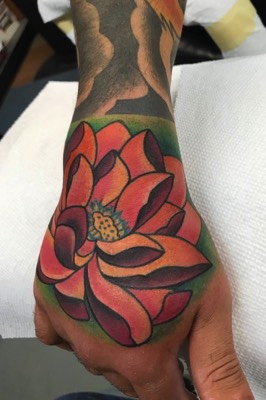  Lotus hand tattoo by Brandon Notch 