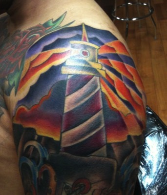  American traditional lighthouse tattoo by Brandon Notch 