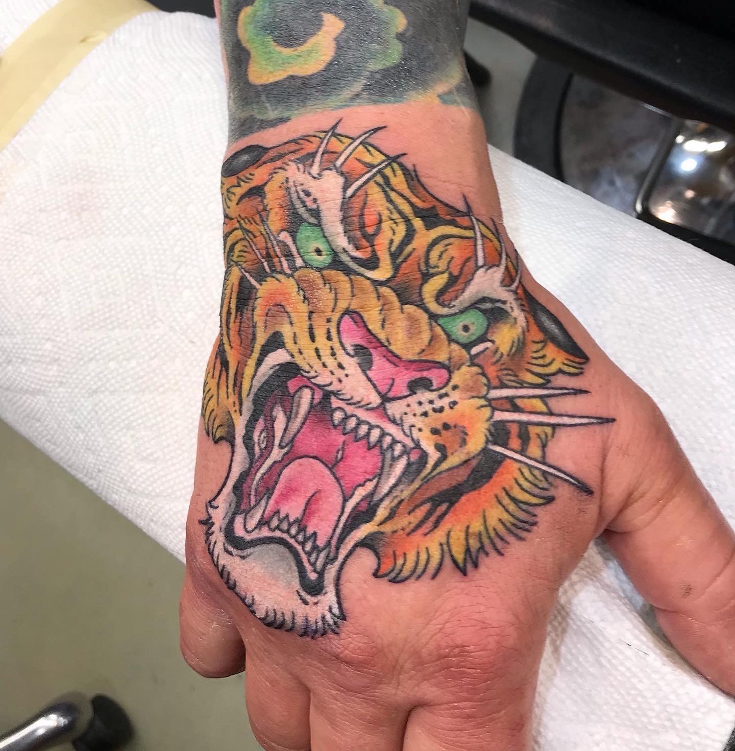  Tiger hand tattoo by Brandon Notch 