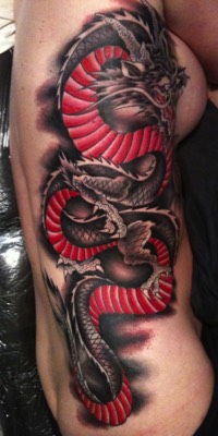  Dragon rib cage tattoo 