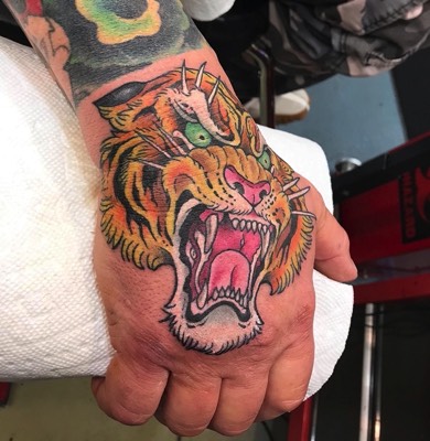  Tiger hand tattoo 