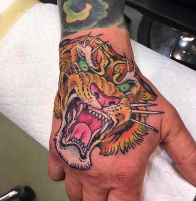  Tiger hand tattoo by Brandon Notch 
