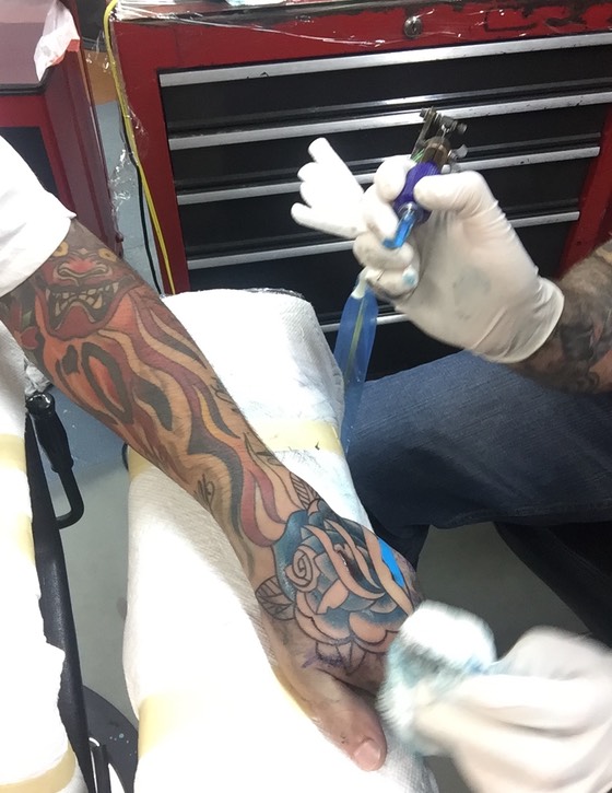  Traditional Rose hand tattoo by Brandon Notch 