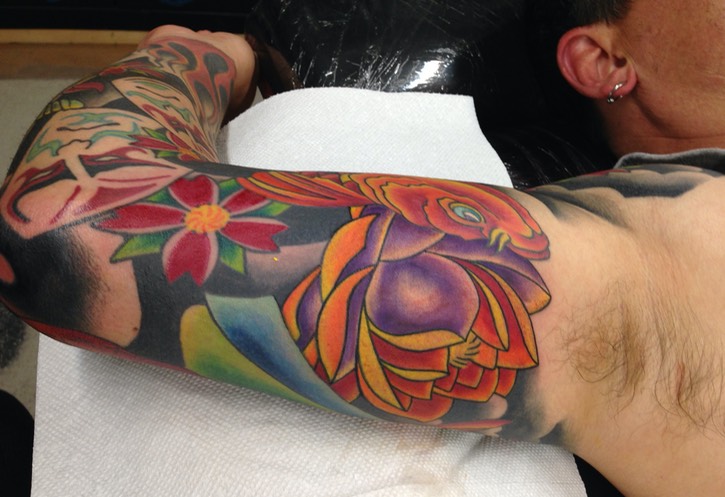  Lotus flower with cherry blossoms tattoo 