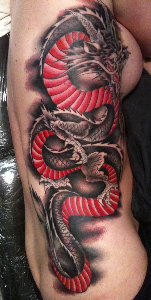  Dragon rib cage tattoo 